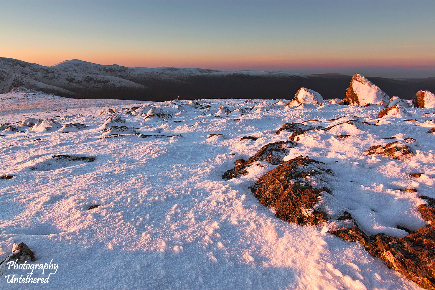 Snowy summit of Red Pike Buttermere.