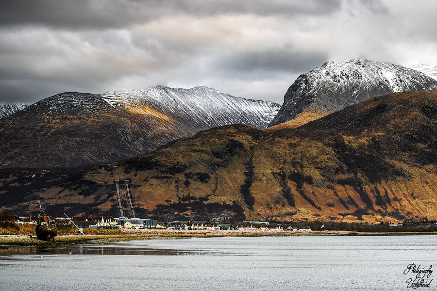 Last light on Ben Nevis from Corpach village in autumn with snow on the top. Landscape Photography Scotland.